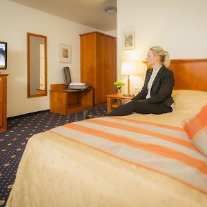 Kamer met een Queen Size Bed